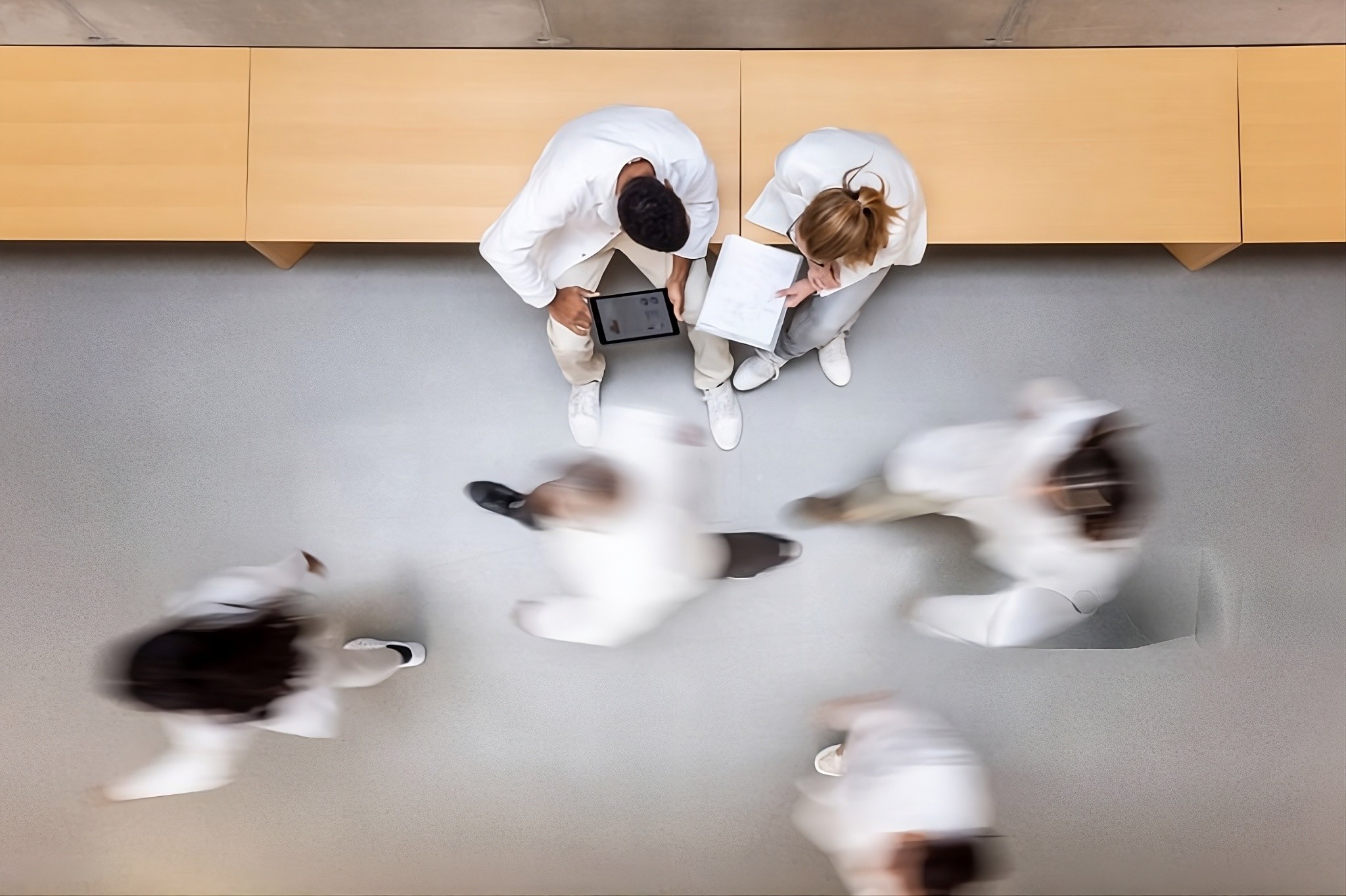 a couple of men standing next to each other