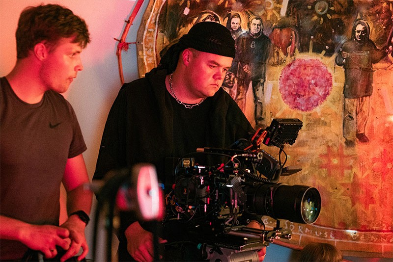 Behind the scenes of Rolling Papers (Pikad paberid) showing the cameraman filming a dynamic bar scene during production