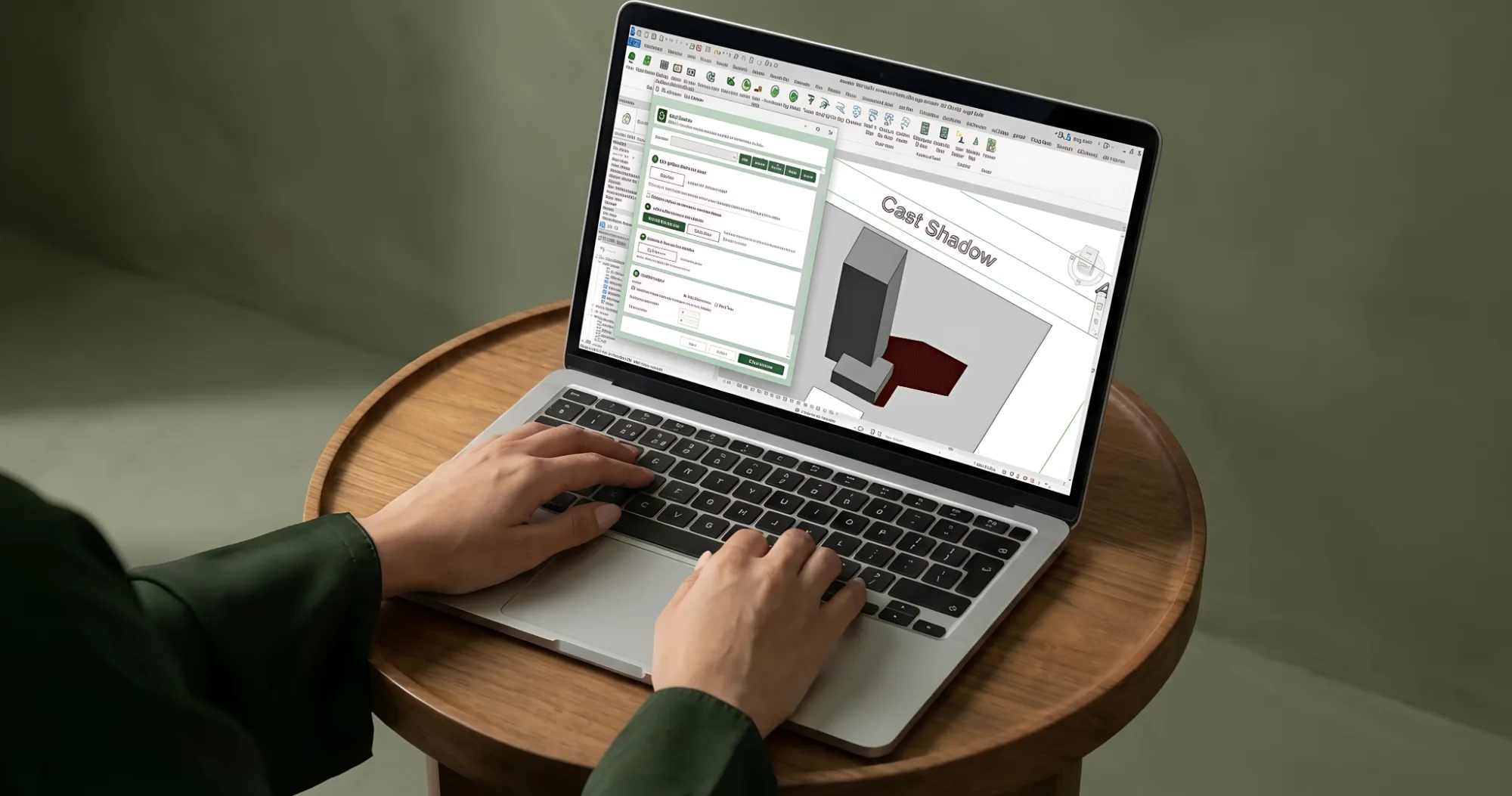 Designer modelling landscape elements in Revit with the XD Landscape plug-in on a laptop