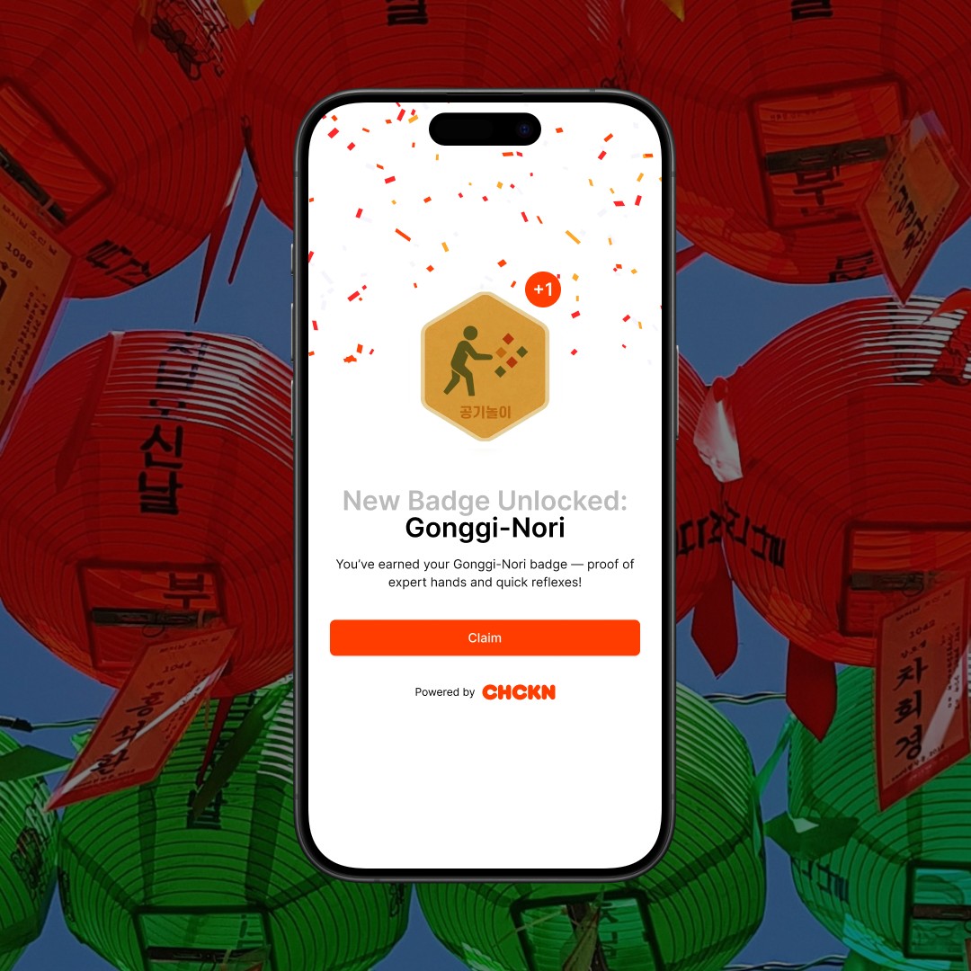 two ladies looking at a laptop and smiling