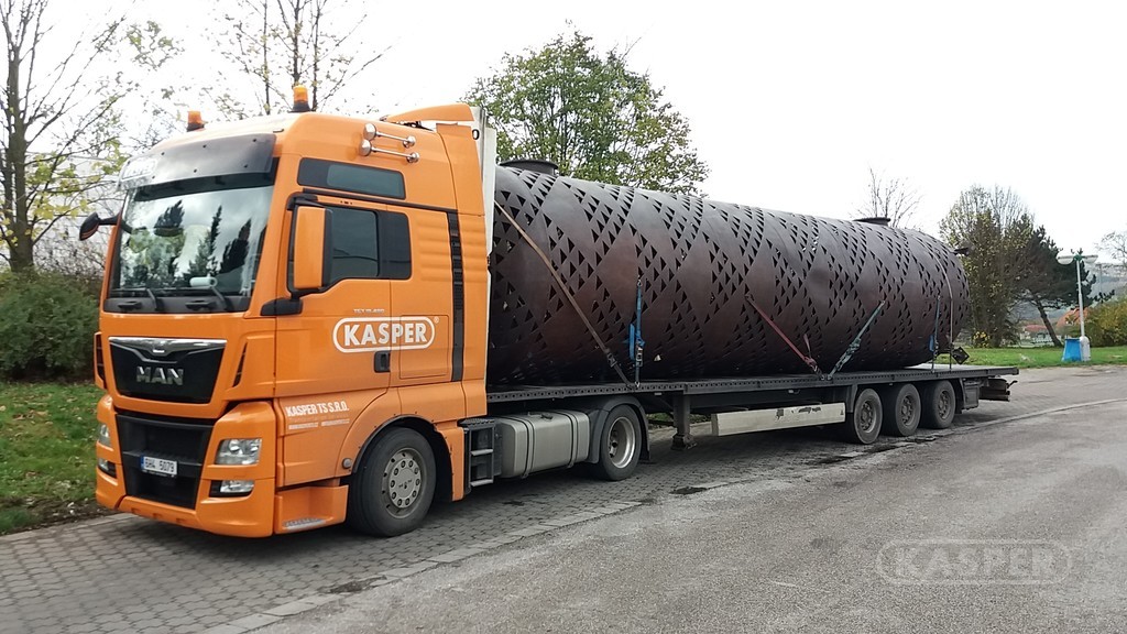 person sitting on chair using Surface