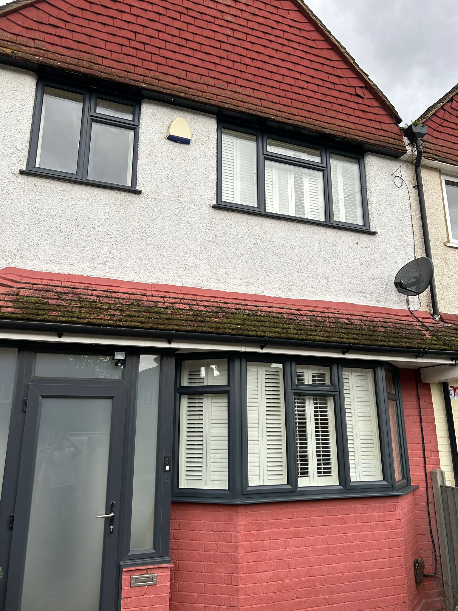 a living room filled with furniture and a fire place