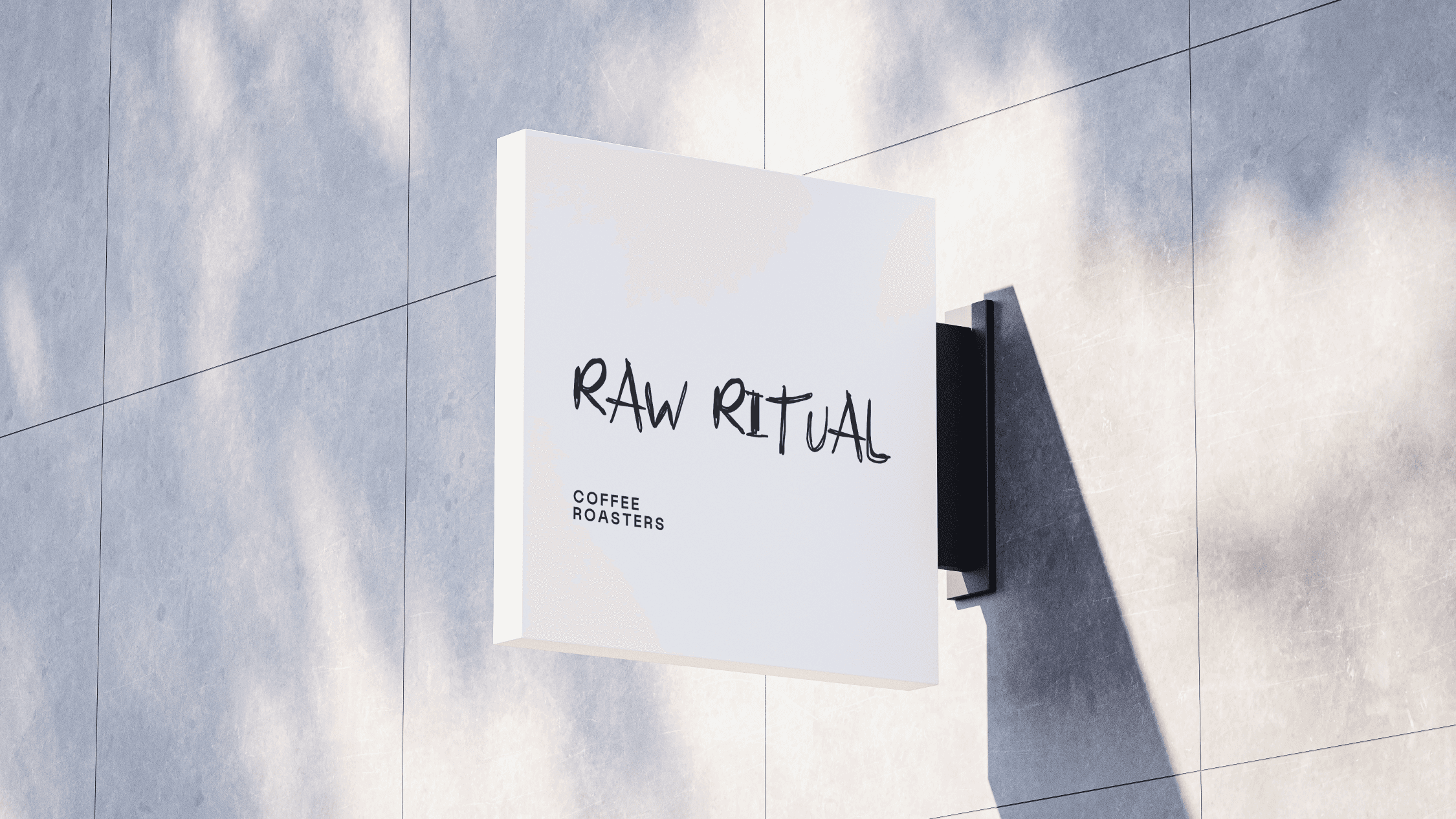 Shiny metallic silver foil pouch lying flat, printed with a large black outline of a smiley face, all set against a bright orange backdrop.