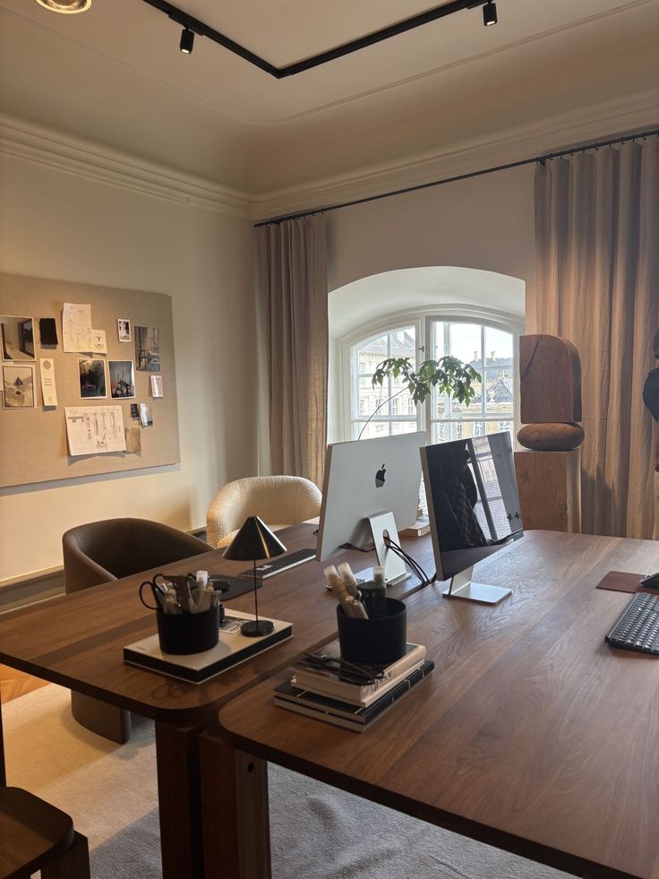black and gray office rolling chair near brown wooden desk