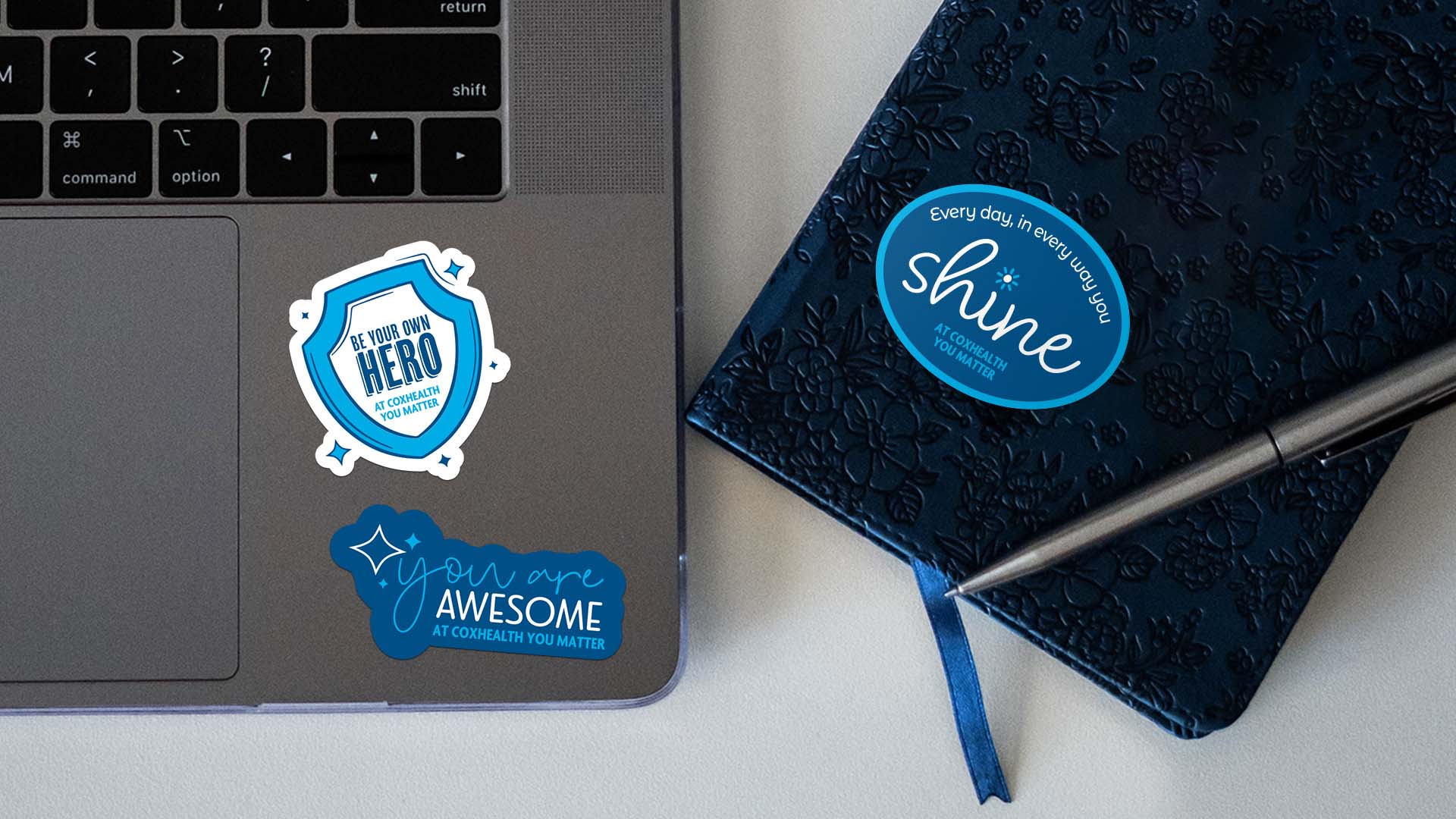 WTADS client Cox Health campaign blue and white stickers.