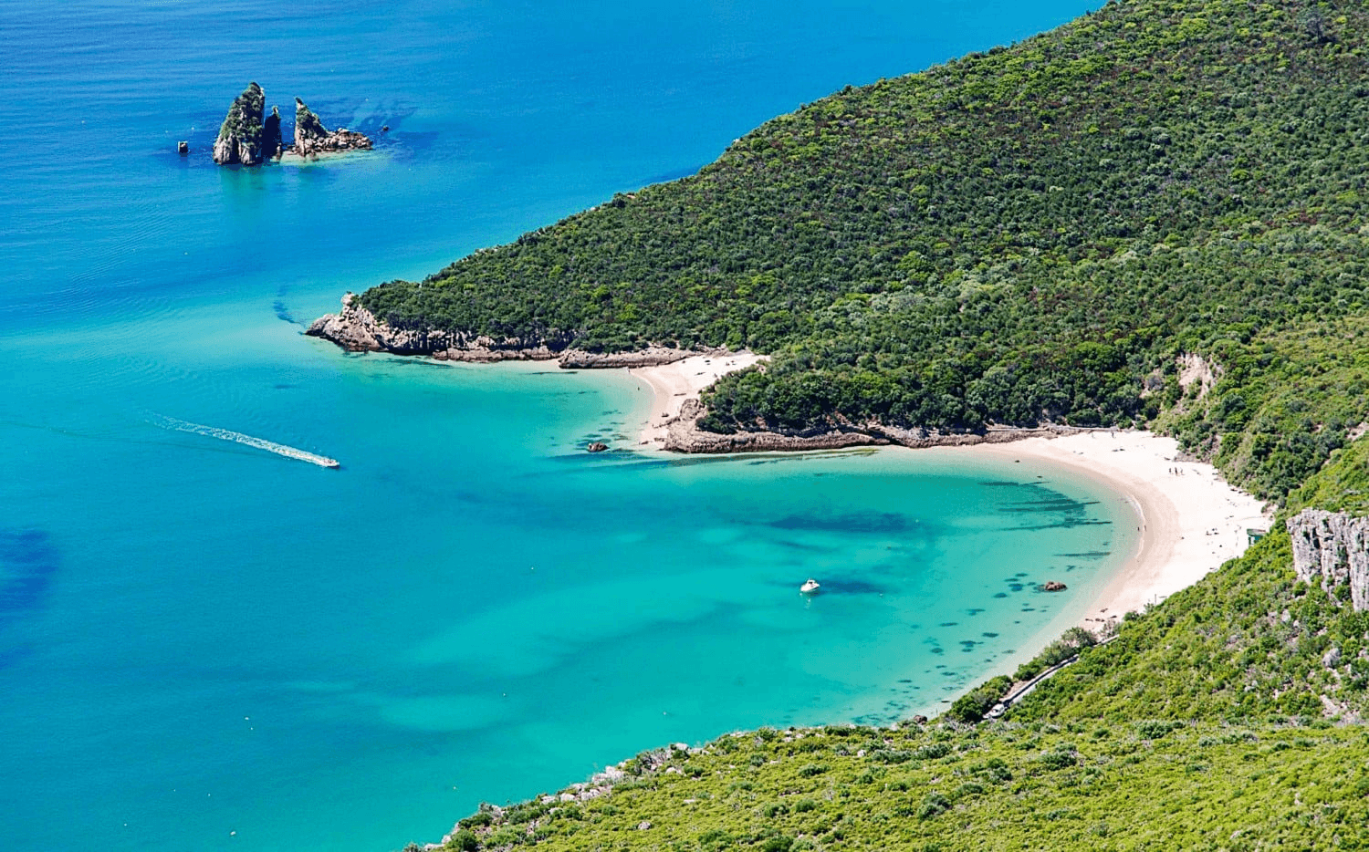 Turquoise bay and beaches at Portinho da Arrábida and Creiro