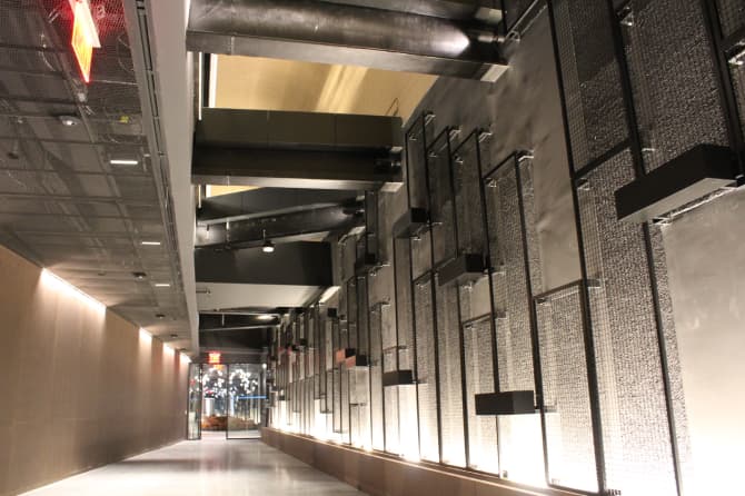 A low shot showing the ornate wall and ceiling