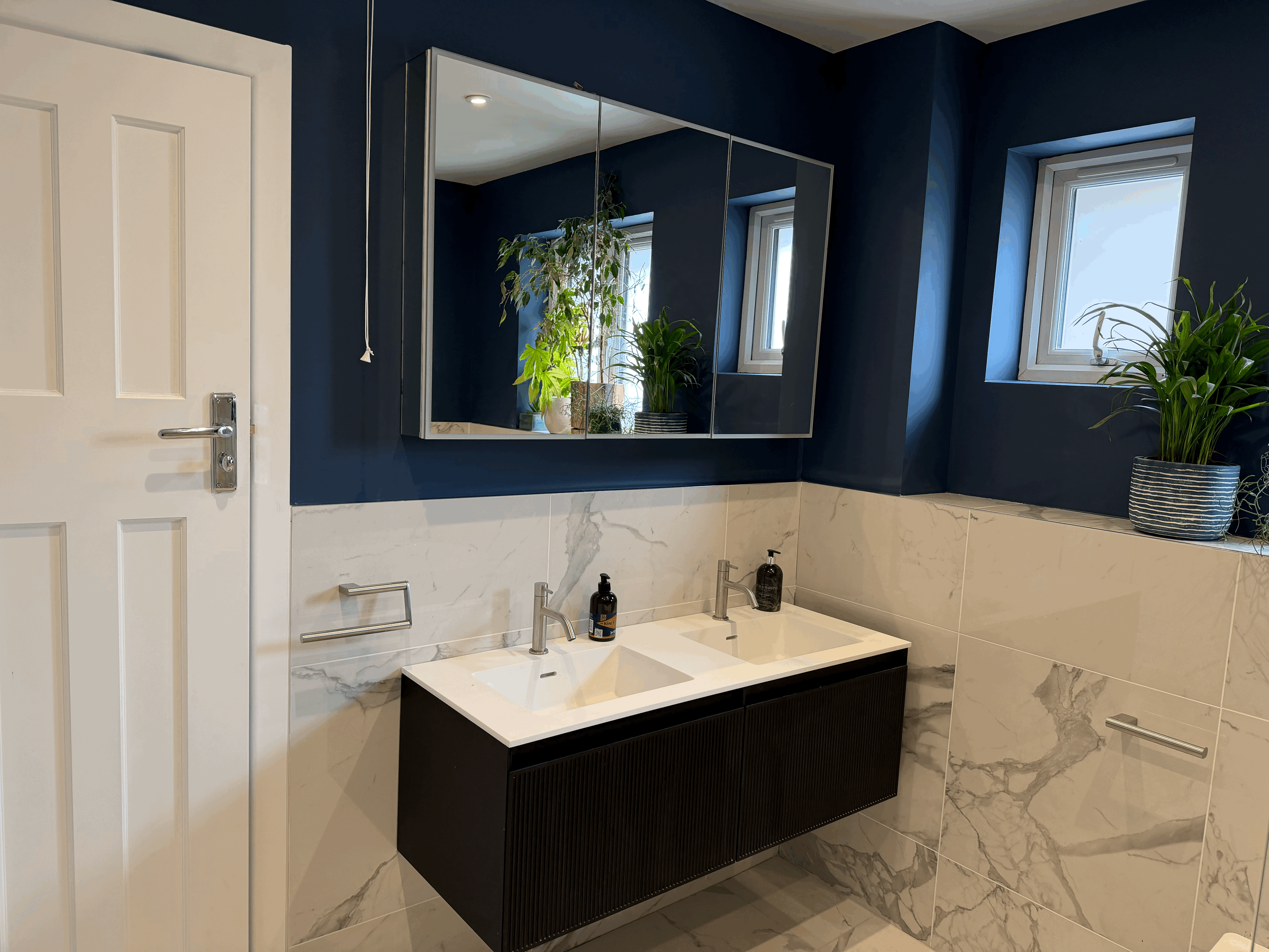 luxury bathroom door opened rear view