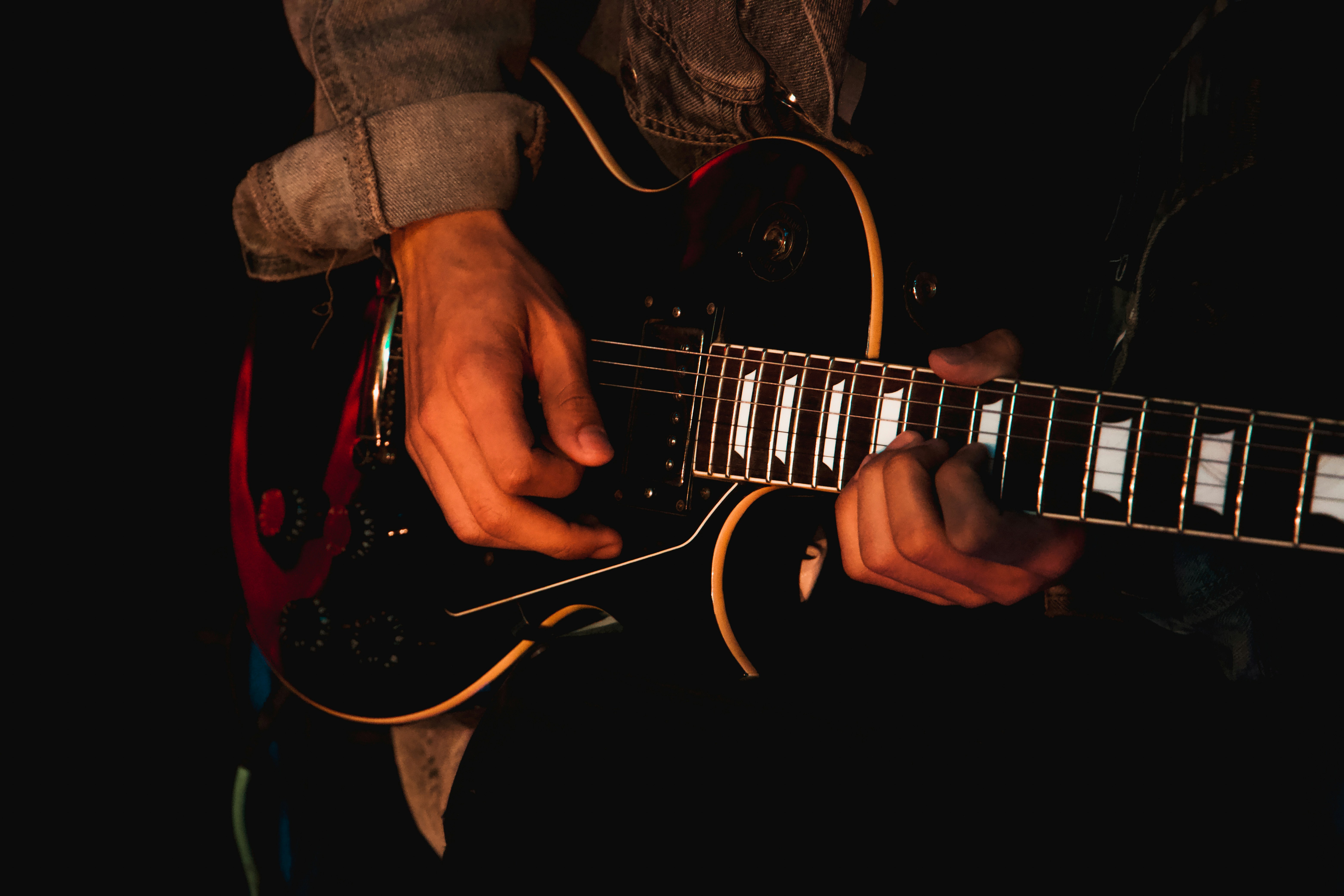 Man playing lead guitar solo