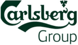 Two founders working side by side at a table.