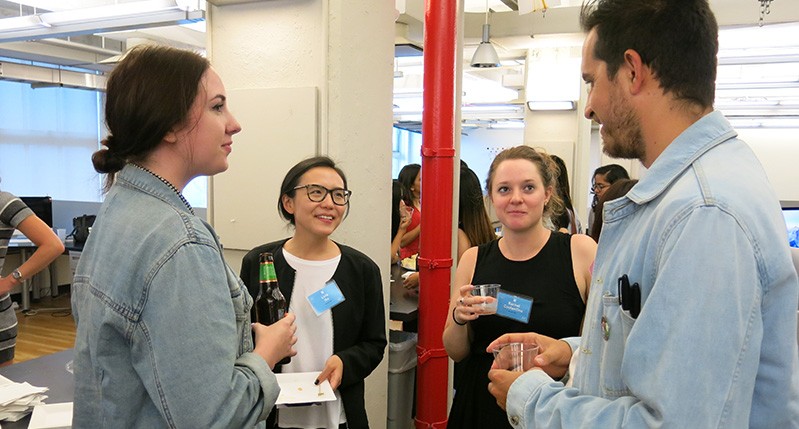 students talking to one another