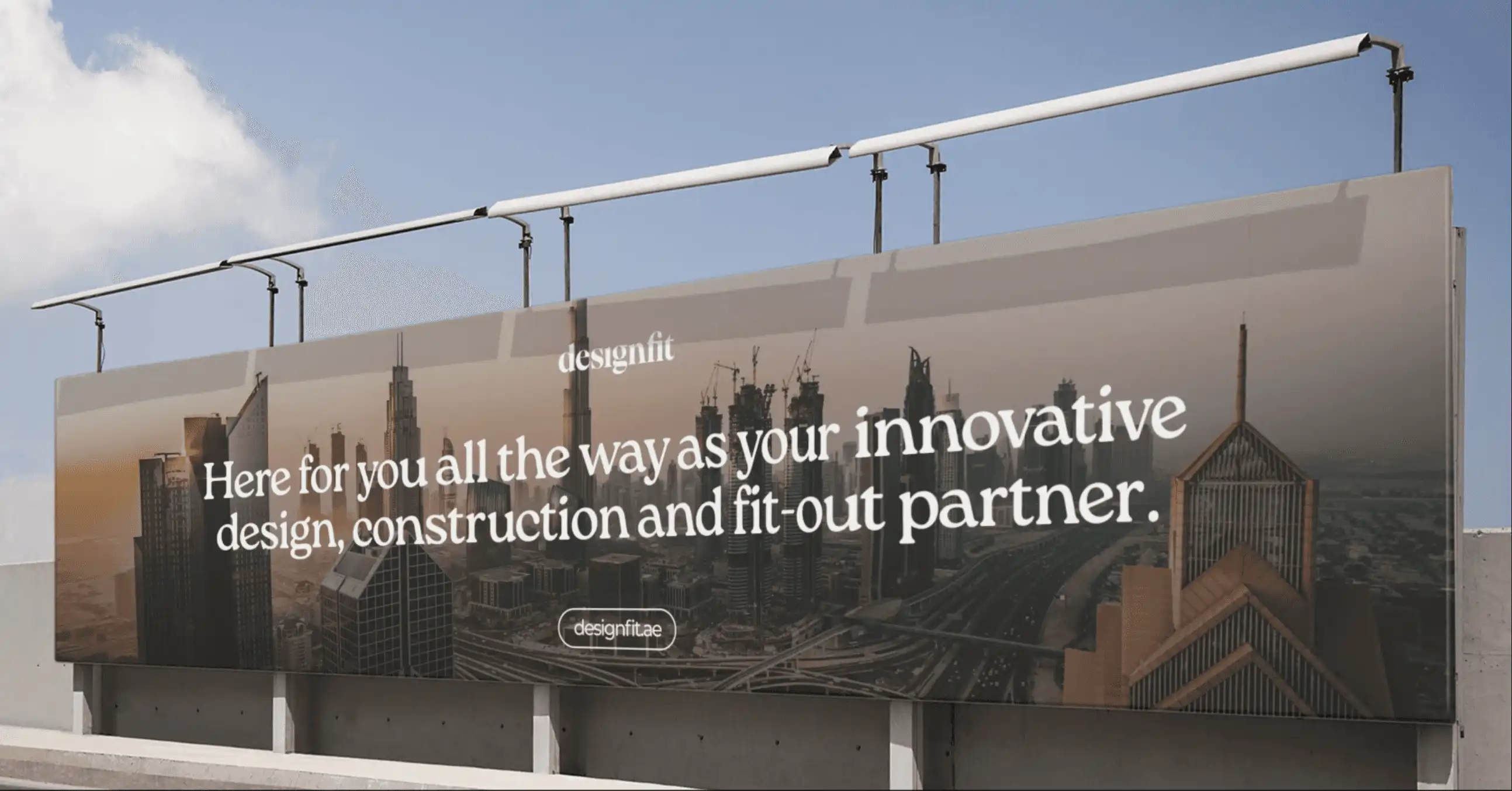 DesignFit messaging on billboard with Dubai background