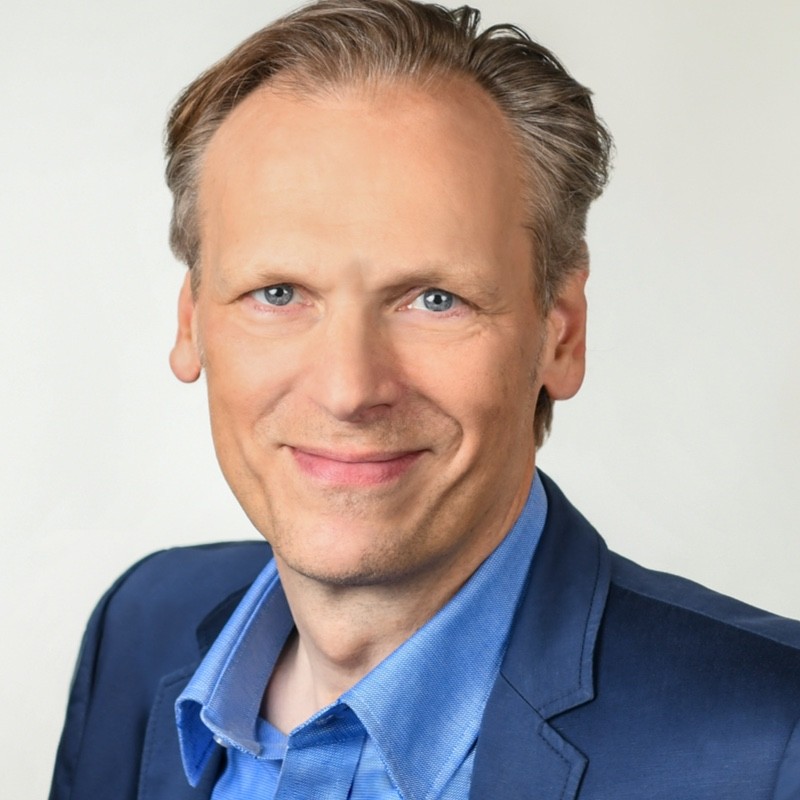 passport photo of Hans-Christian Schwingen, Chief Brand Officer