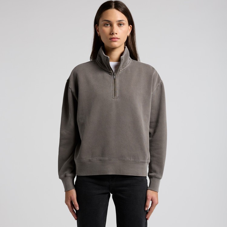 A garment washed women's fit grey quarter zip on a model.