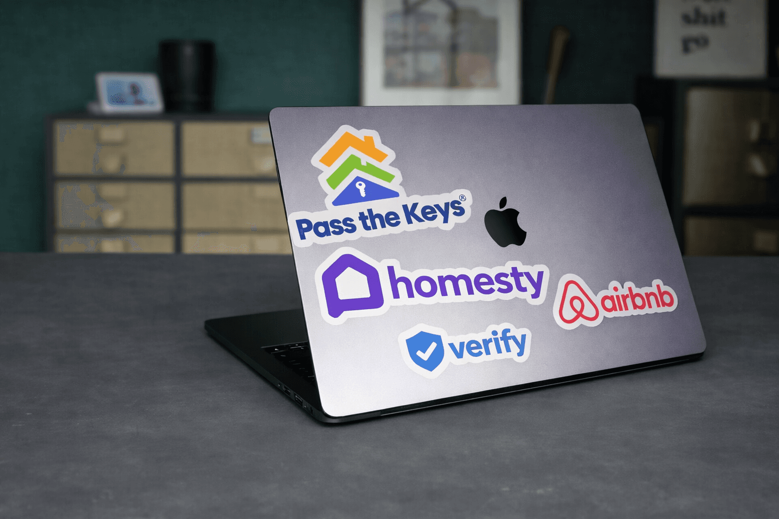 woman in blue tank top standing beside white wall