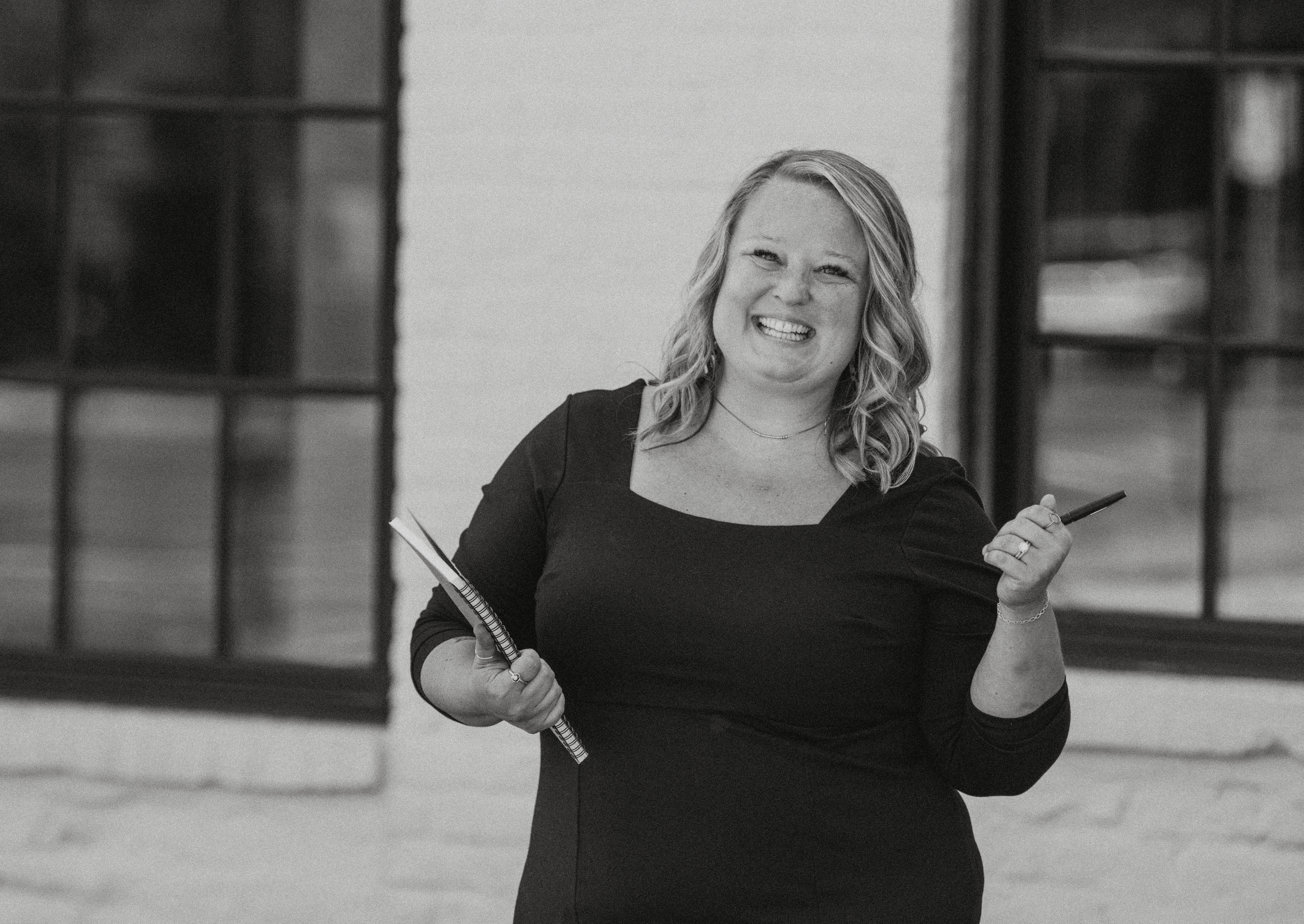 A mother and her daughter are working together on a laptop, focusing on homework