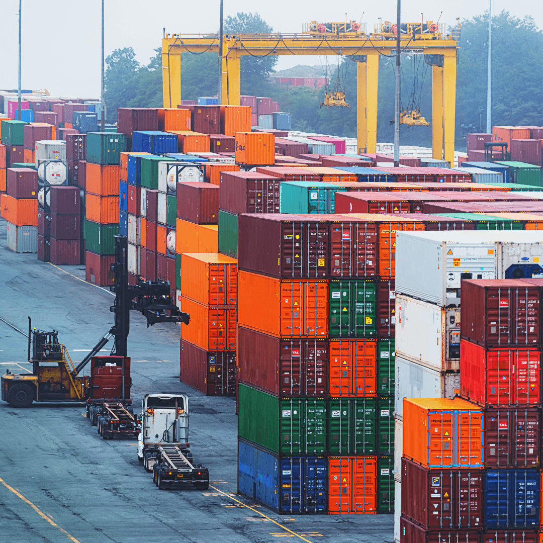 husband and wife working happily on a laptop
