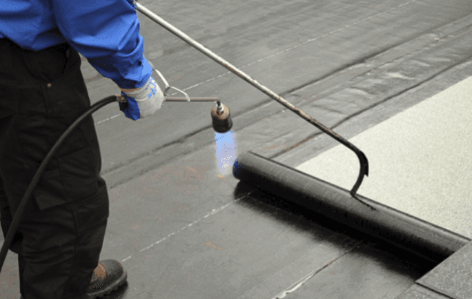 roofers working on roof