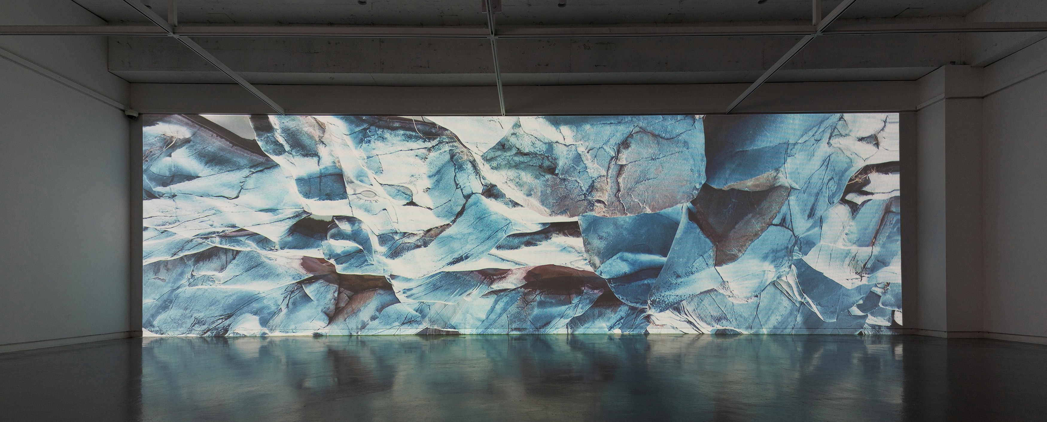 Blurred portrait of woman wearing futuristic helmet