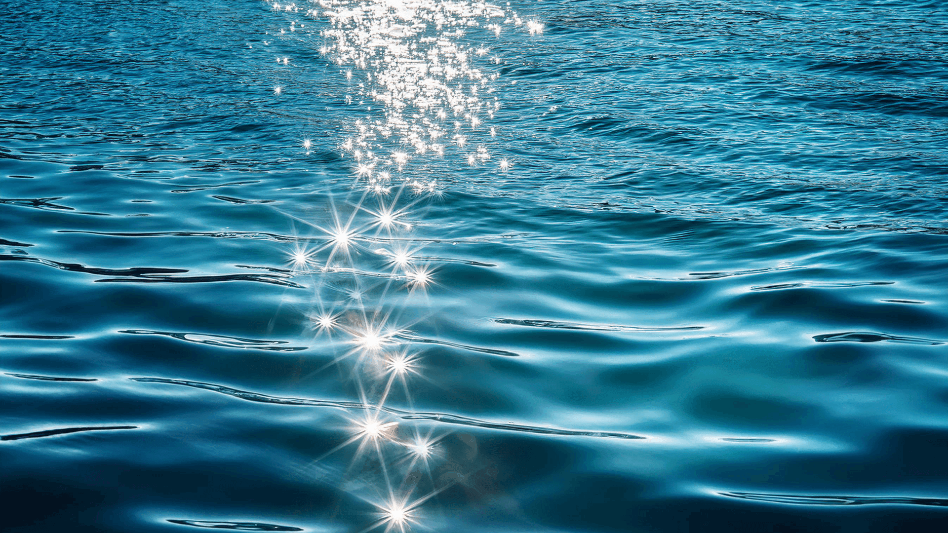 Sunlight sparkling on the calm Caribbean blue waters near Club Vieques, Puerto Rico.