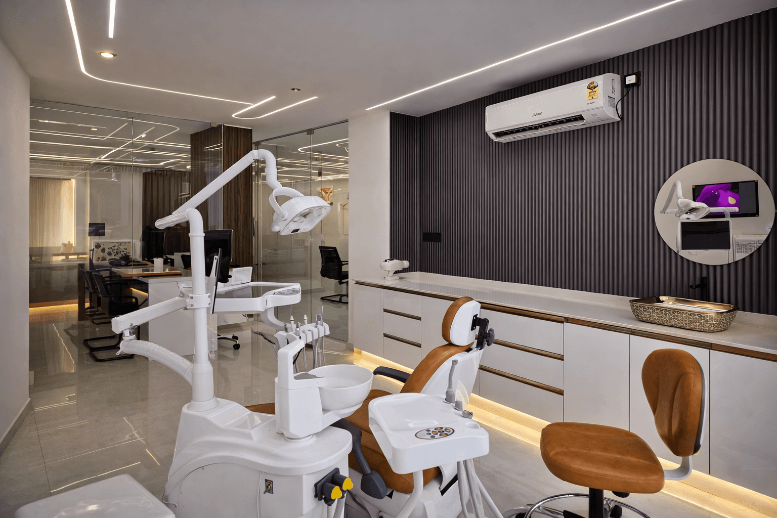 Modern two-story home with large glass windows, warmly lit interiors, and a balcony. Surrounded by trees and a manicured lawn at dusk. Cozy ambiance.