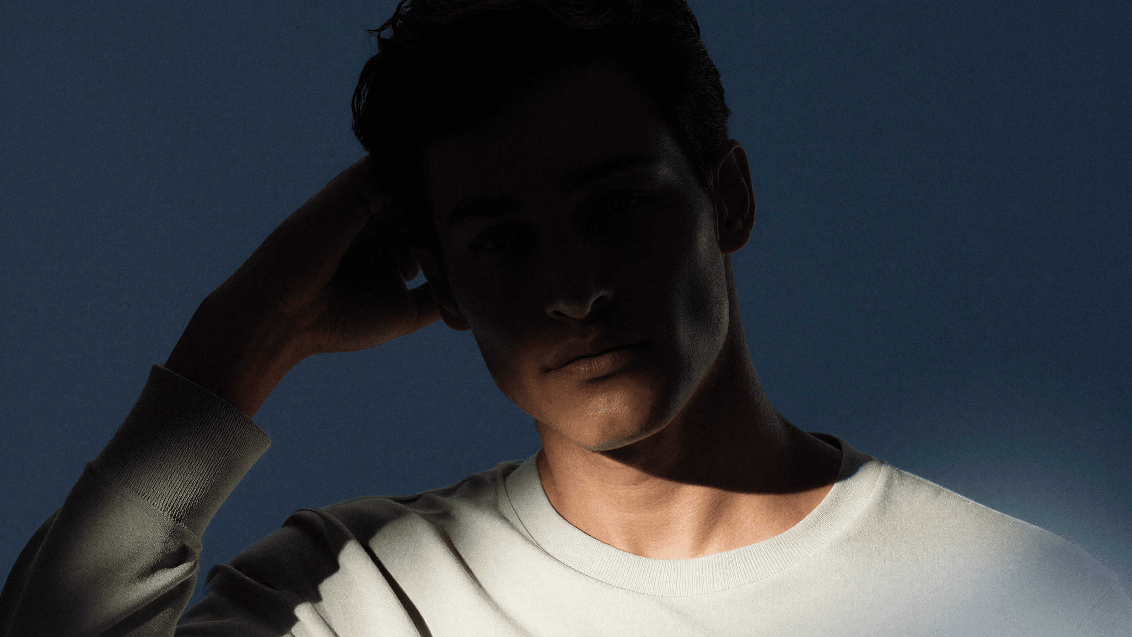 AI-generated imagery for Withings sleep tracking, featuring a male model in a soft, atmospheric morning setting.