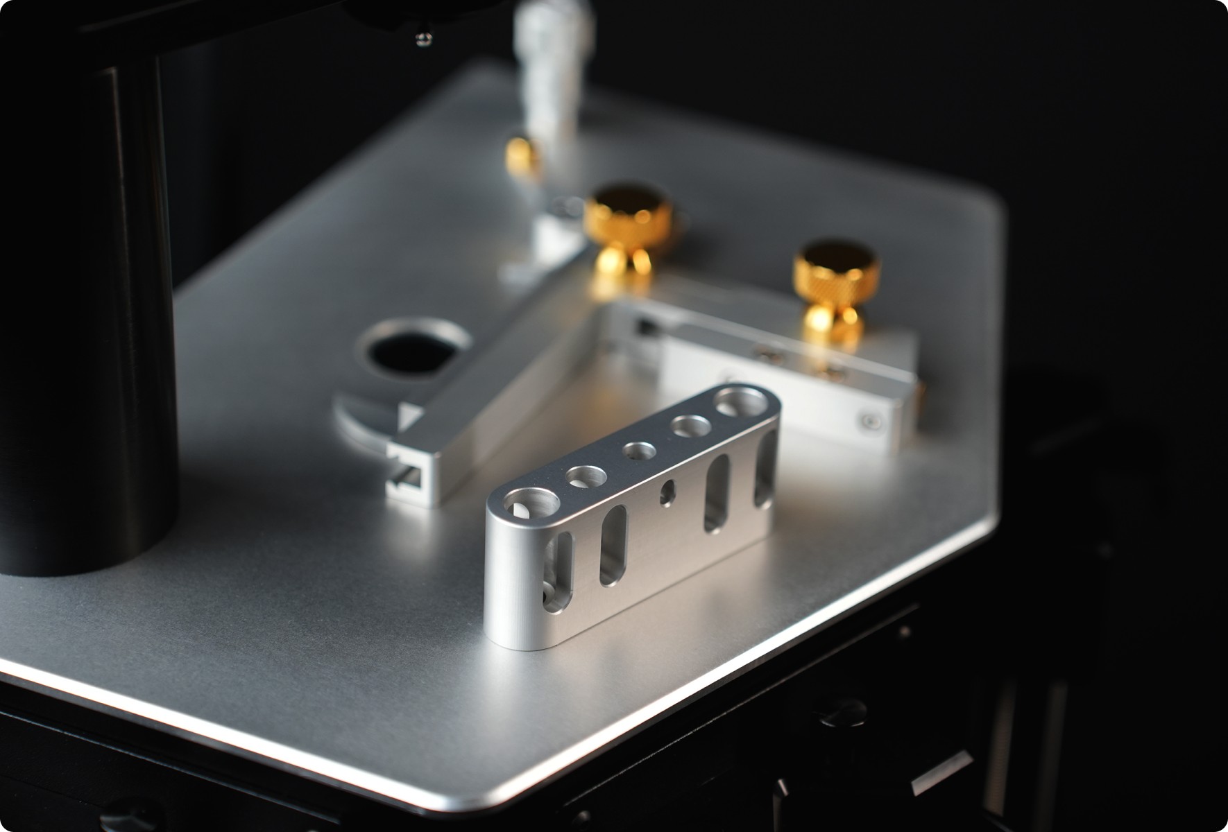 Silhouettes of two people sitting in a meditative pose against a red background, featuring a framer template orbitx premium portfolio website design.