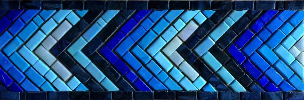 Chevron mosaic border, Blues on navy, hand-cut — reference H-16, Mosaiclegs Art Studio