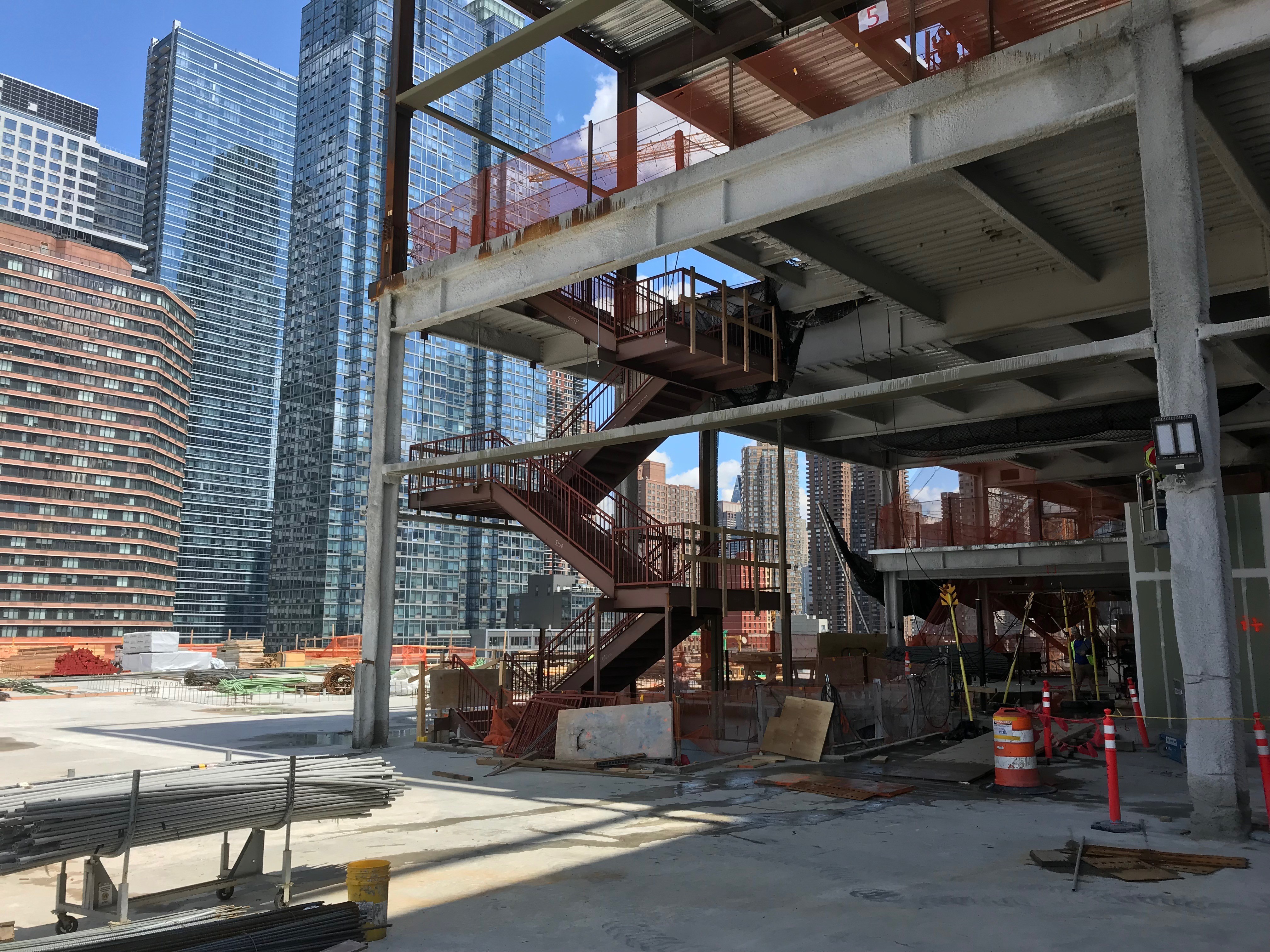 Architectural stair design at the Jacob Javits Center addition in New York, a structural engineering project by Shelley Engineering.