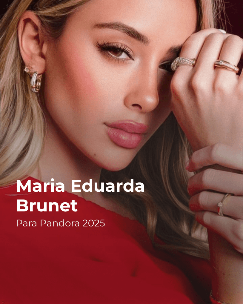 Close-up of two smiling friends with freckles, bright makeup, on a light blue background—joyful, inclusive brand portrait.