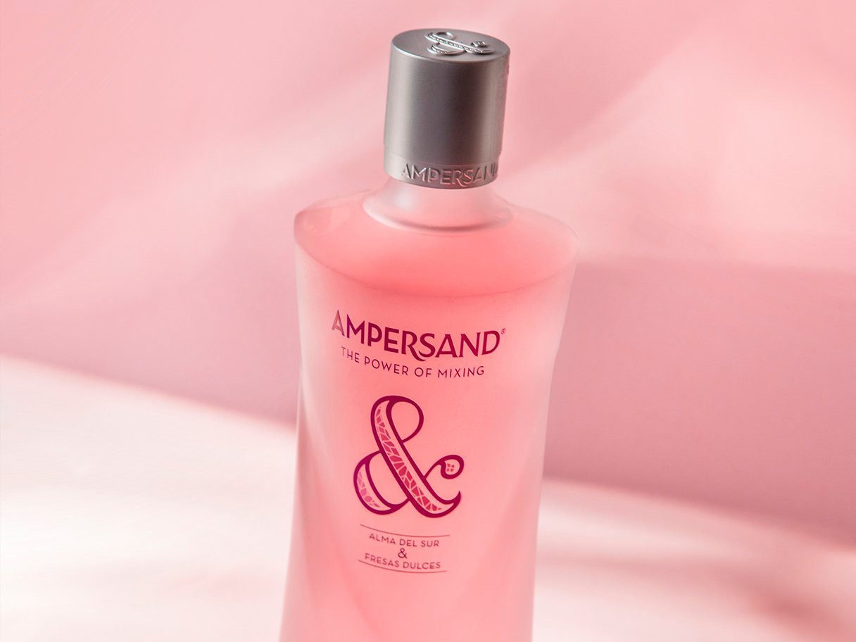 Rustic cabin in a golden field at sunset