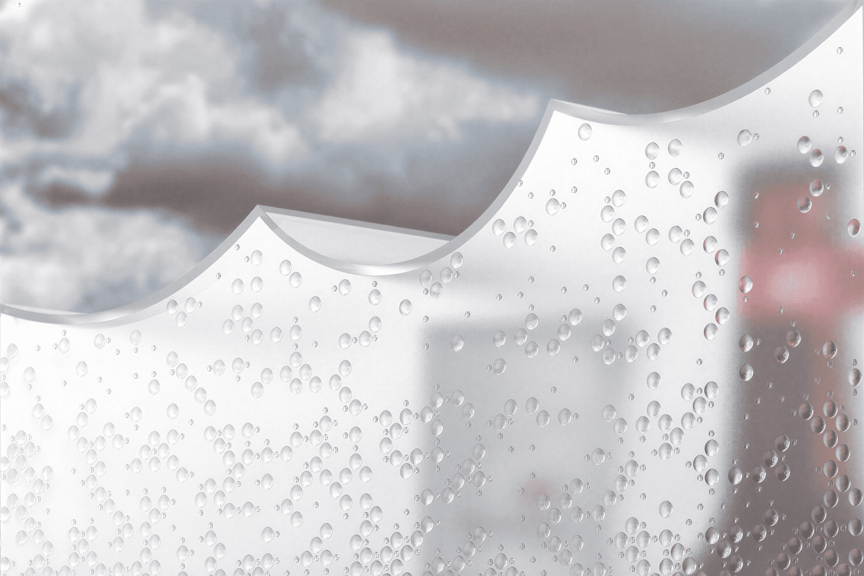 Bubbles on a frosted surface with clouds and blur building background