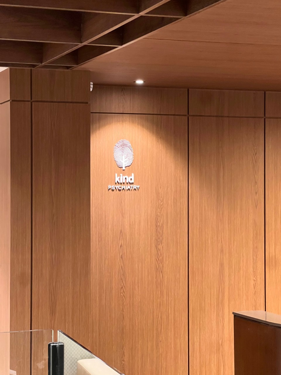 a table and two stools in a room