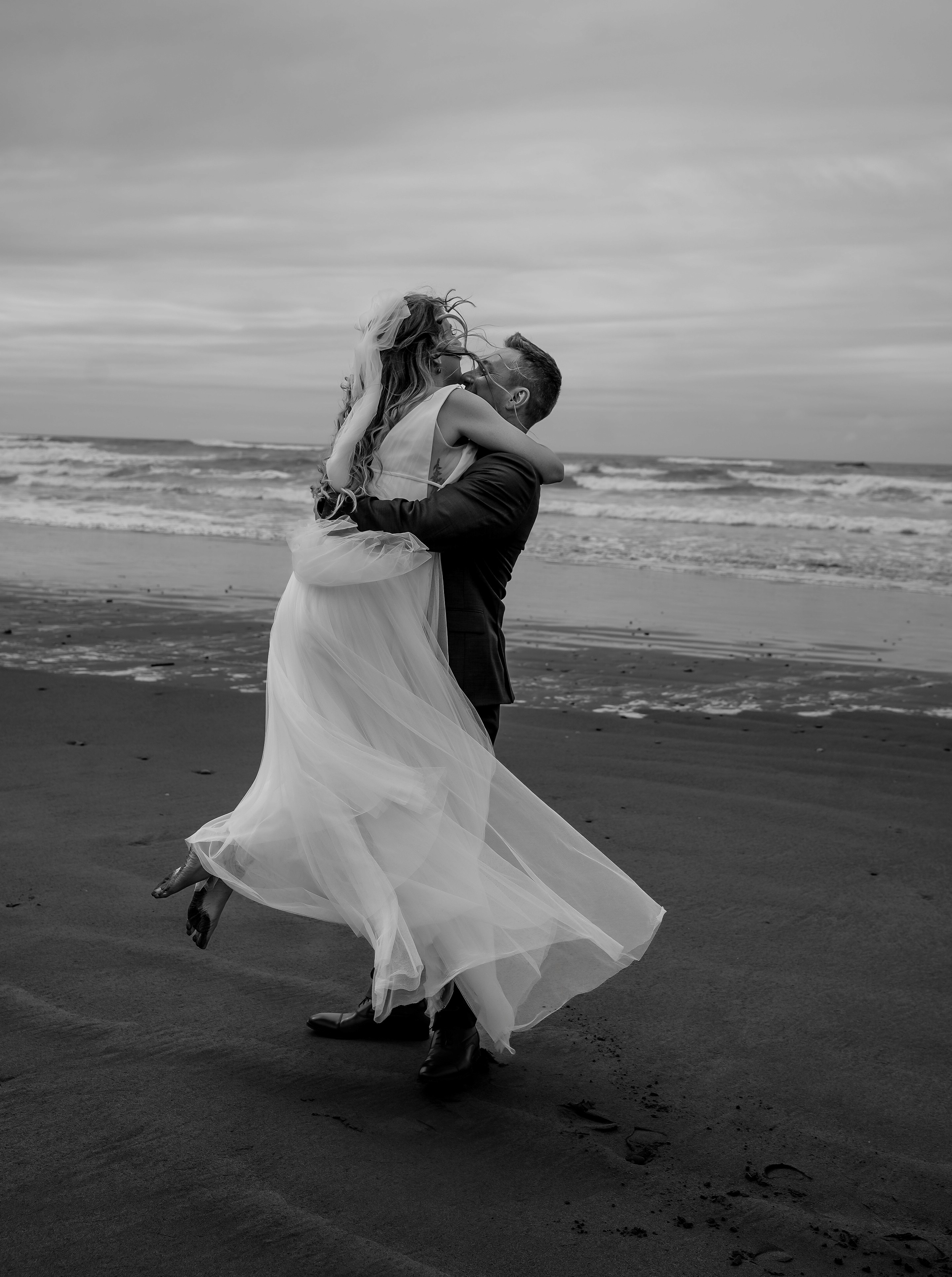 Couple dancing by the sea