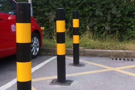 White steel security bollard.