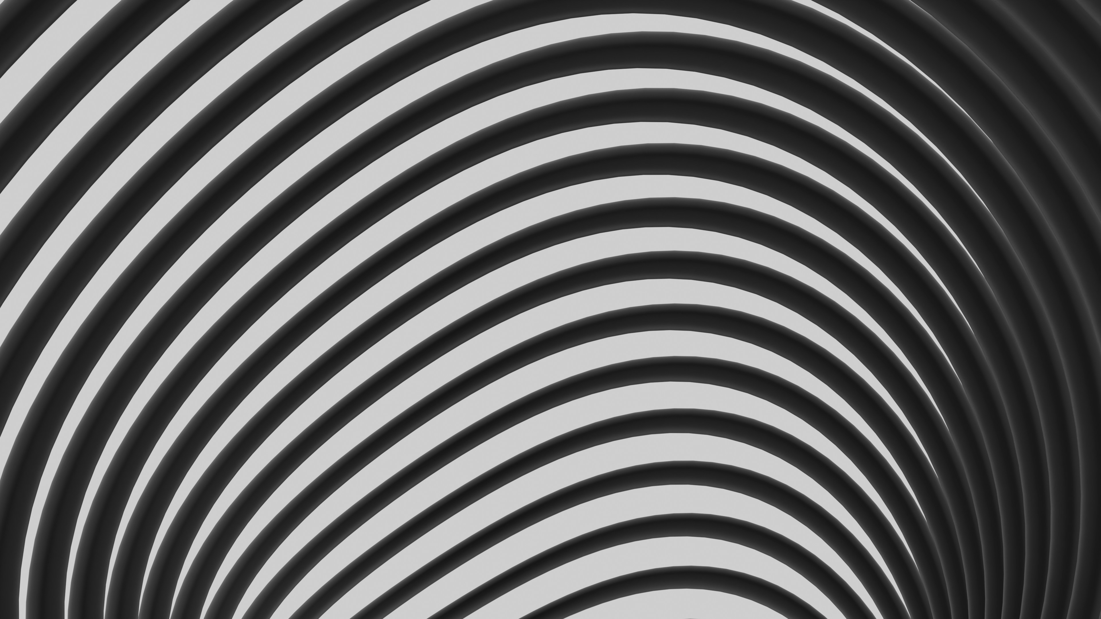 a black and white photo of a spiral design