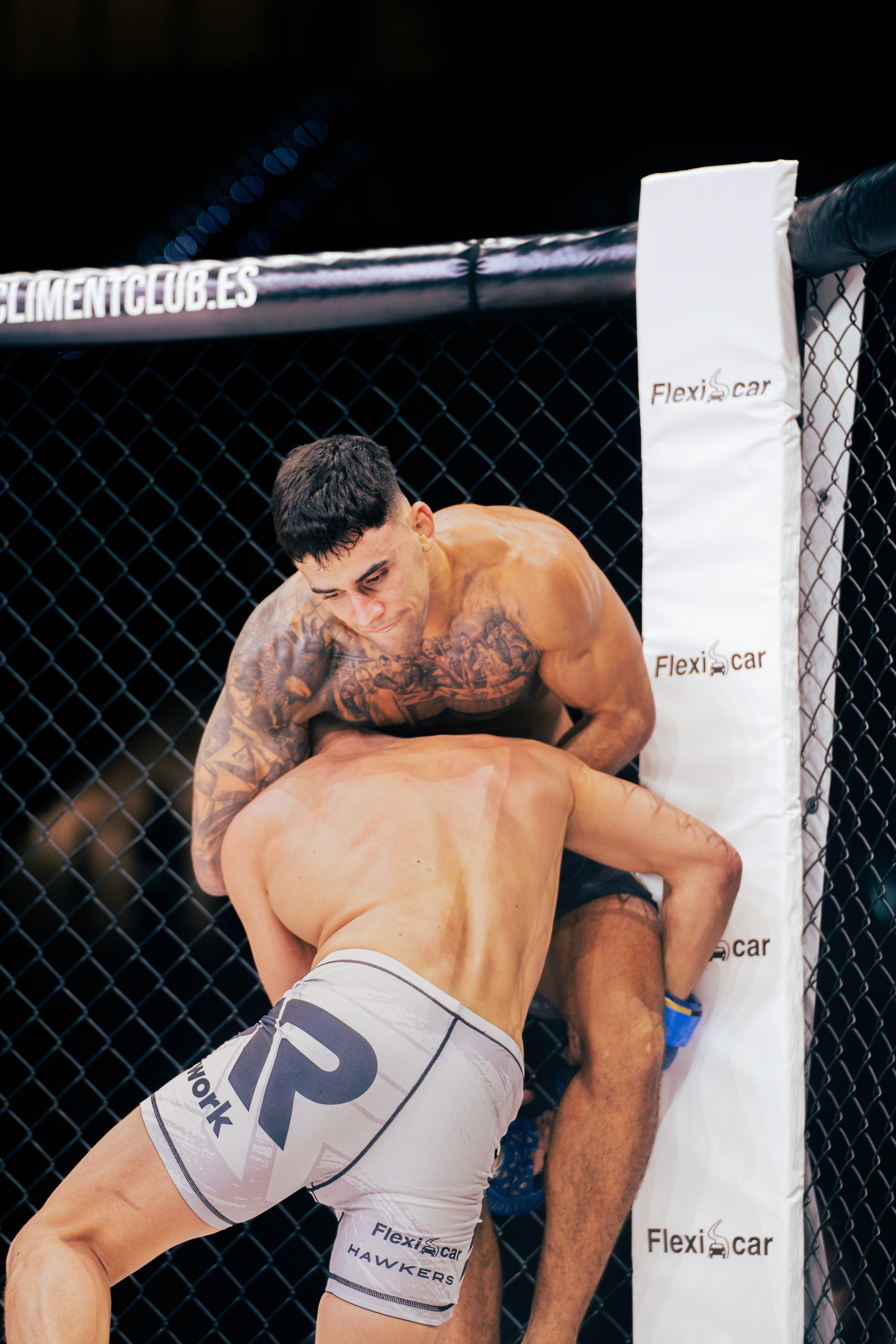 A woman with a head made of mirrors, reflecting light and creating a kaleidoscopic effect around her.