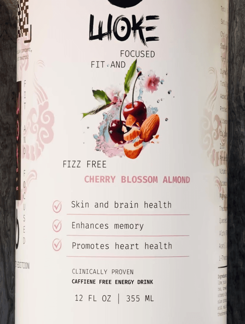 Macro of clear effervescent bubbles in water on a soft gray background—sparkling, minimal texture for clean skincare aesthetic.