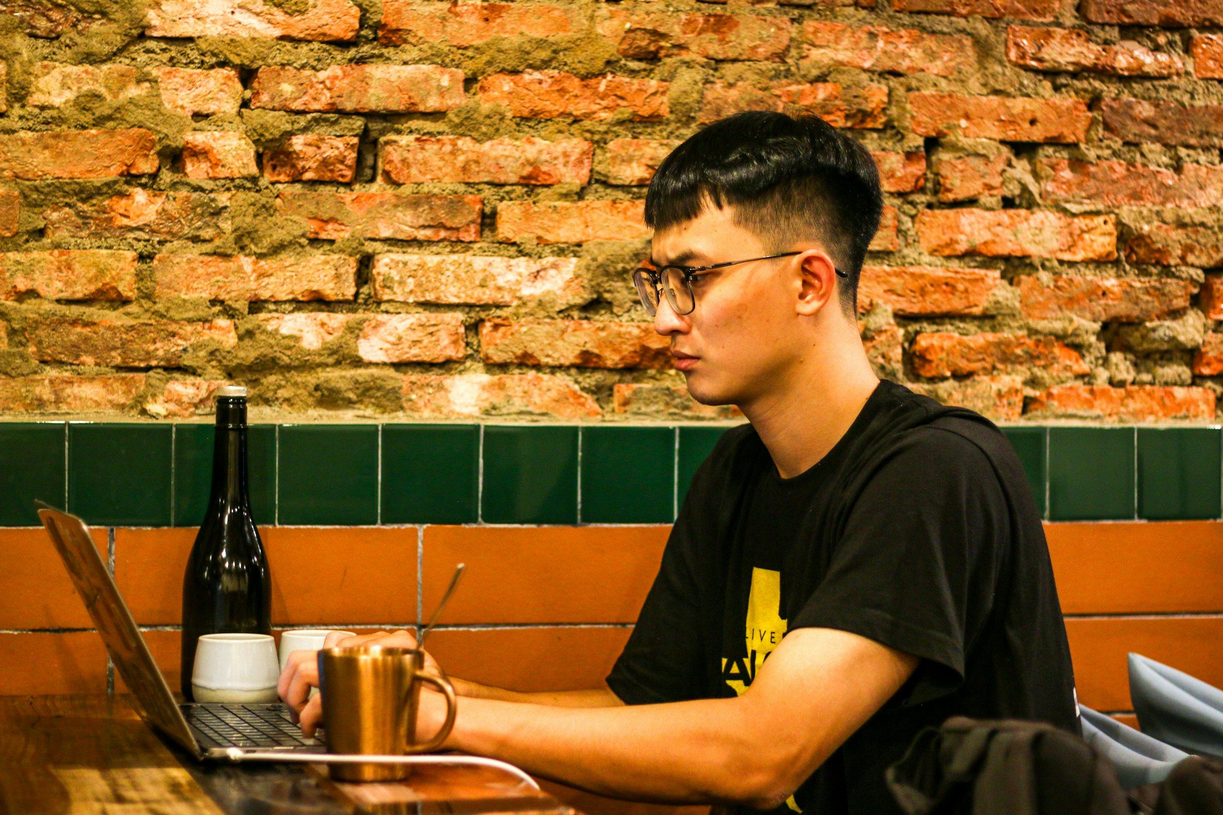 man working alone in cafe - Mendeley Alternatives