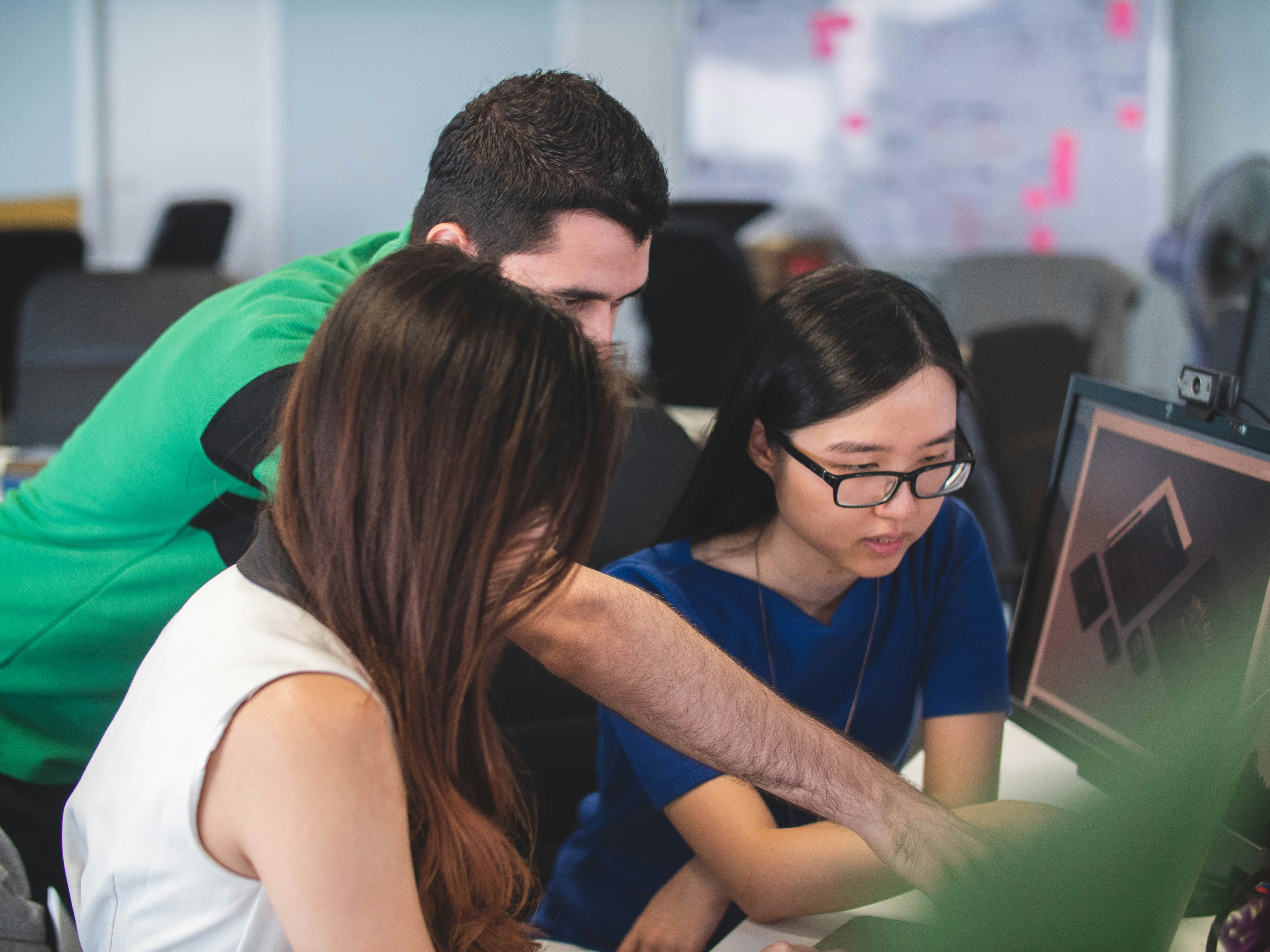 people discussing - Questions to Ask a Developer in an Interview