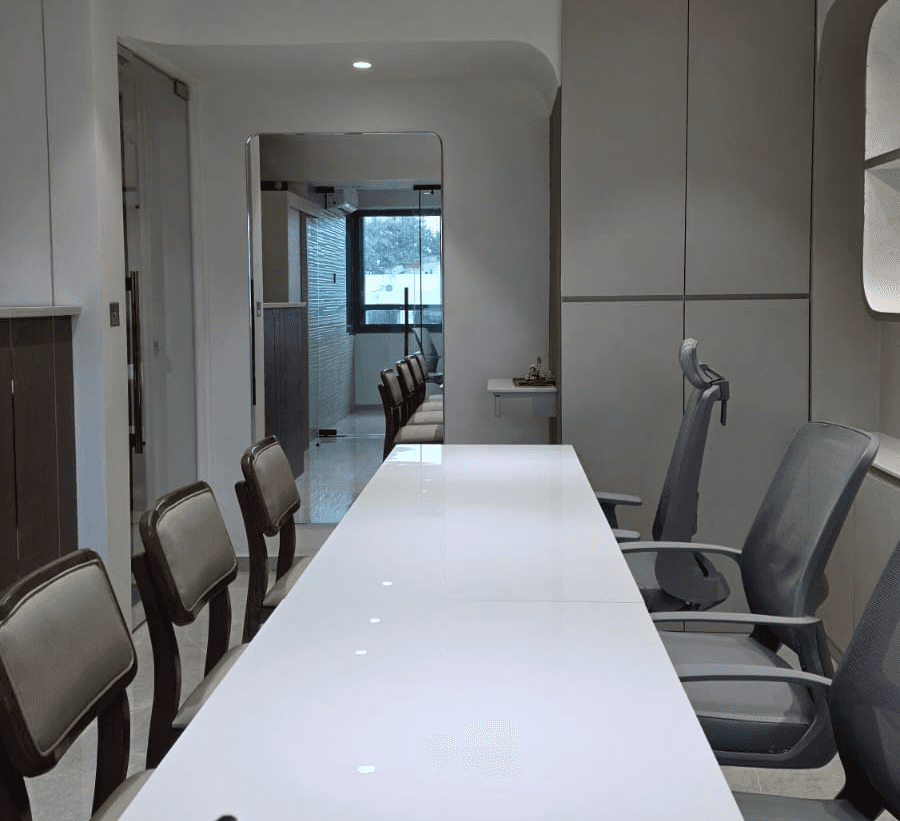 Modern dining area with sculptural chairs and a neutral palette