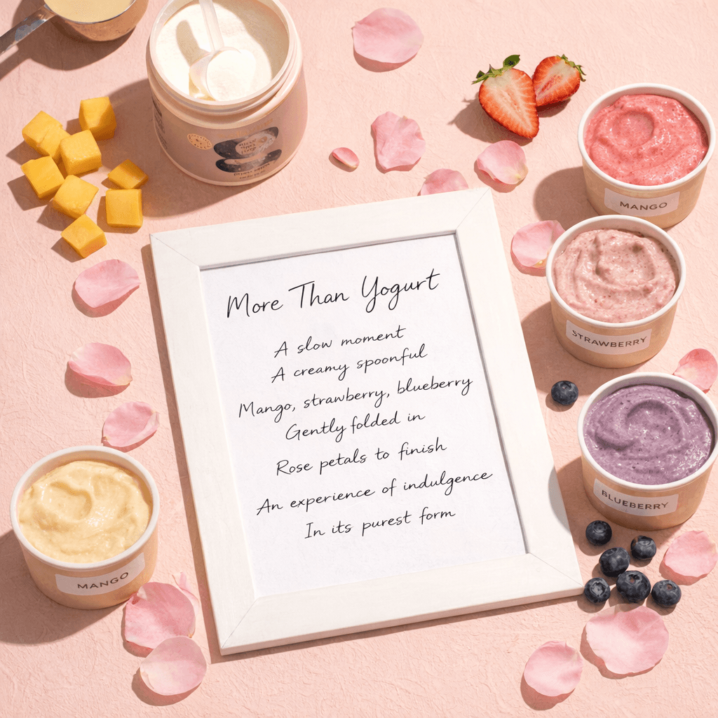 a table topped with bowls of food and a note