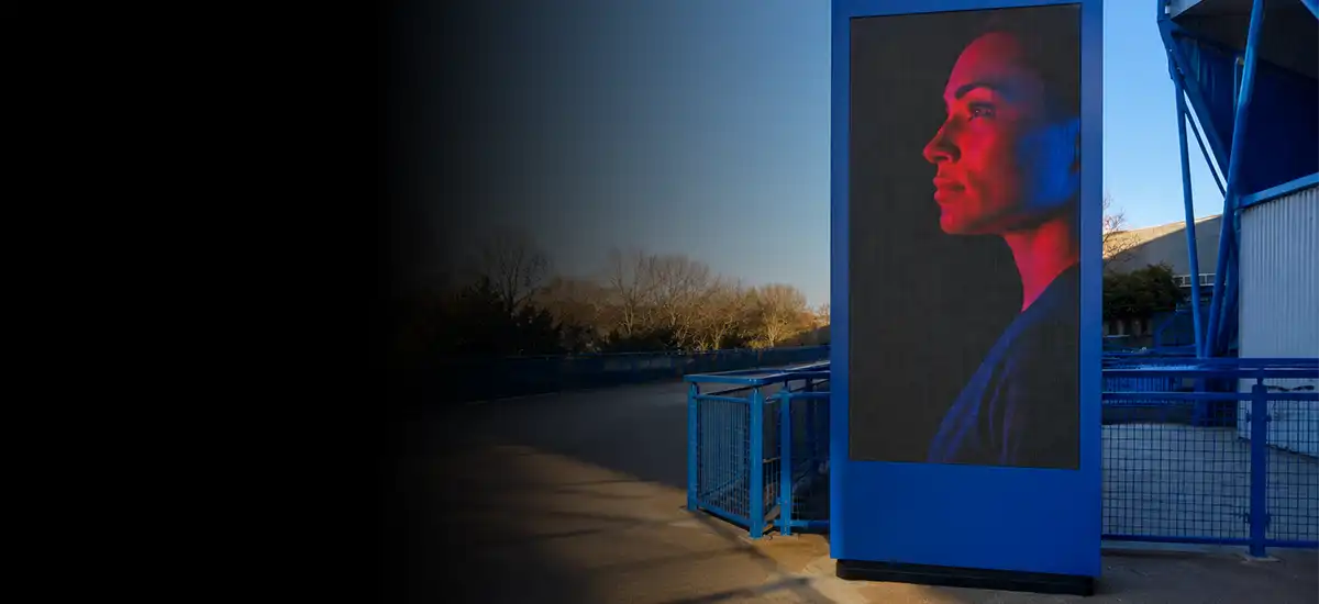 Outdoor portrait digital signage display in a commercial environment