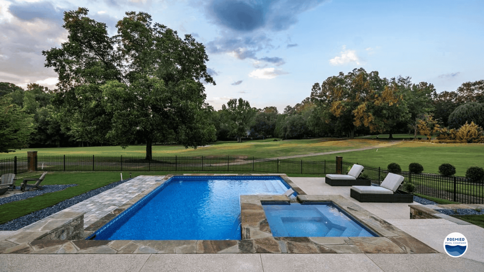 Finished inground pool in an Ohio backyard with professional installation.