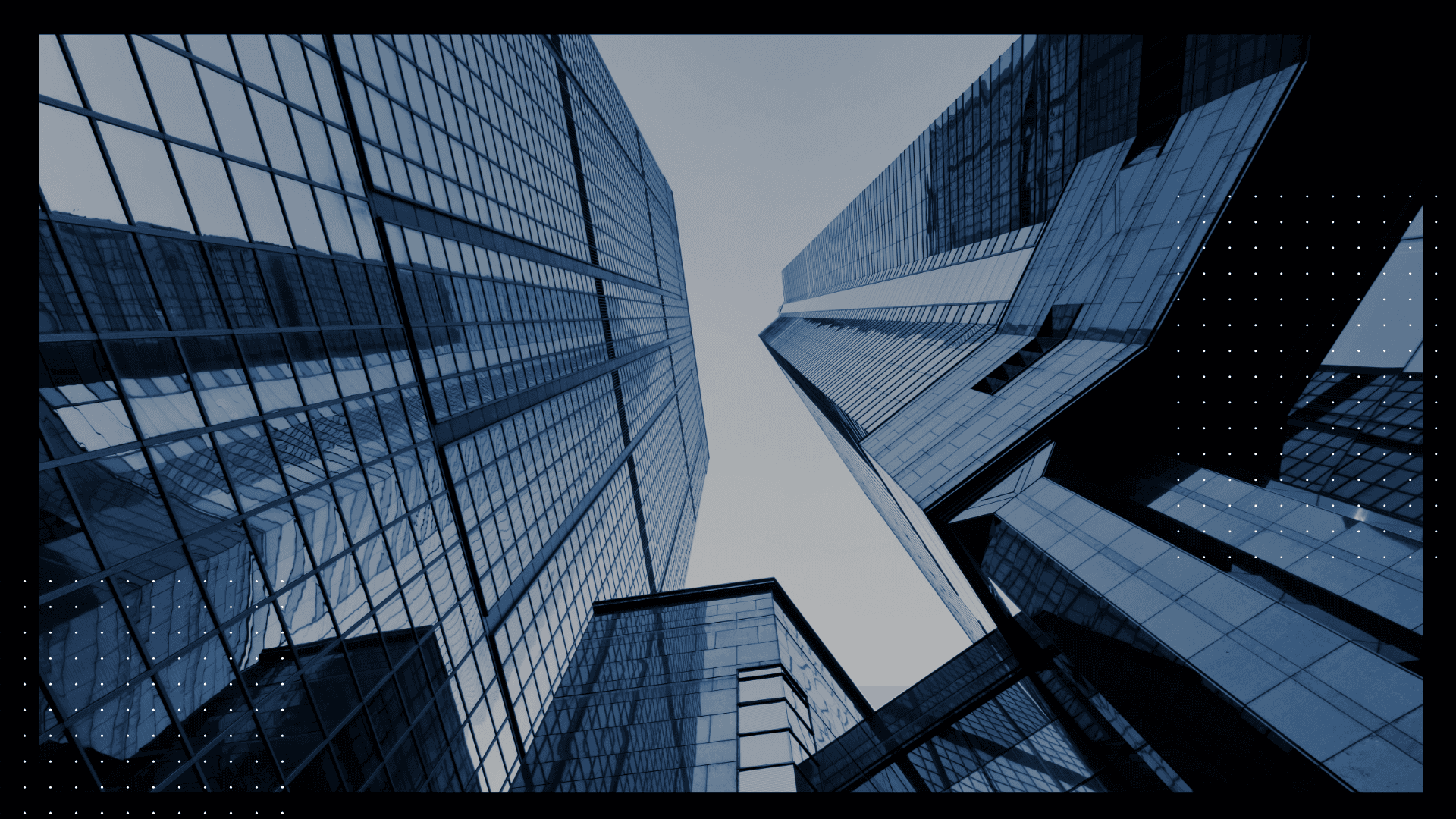 man wearing gray polo shirt beside dry-erase board