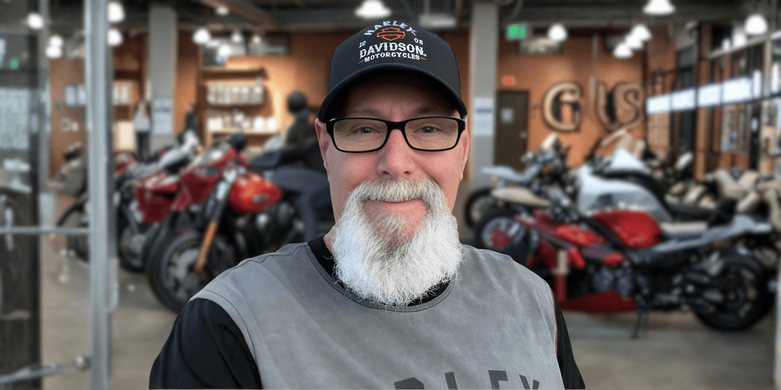 Harley Steve, a renowned Harley-Davidson sales expert, providing personalized motorcycle advice in a well-known dealership environment.