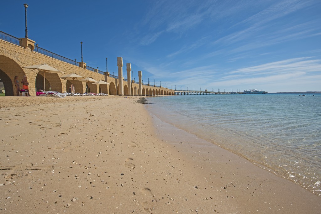 A car is parked in front of a house