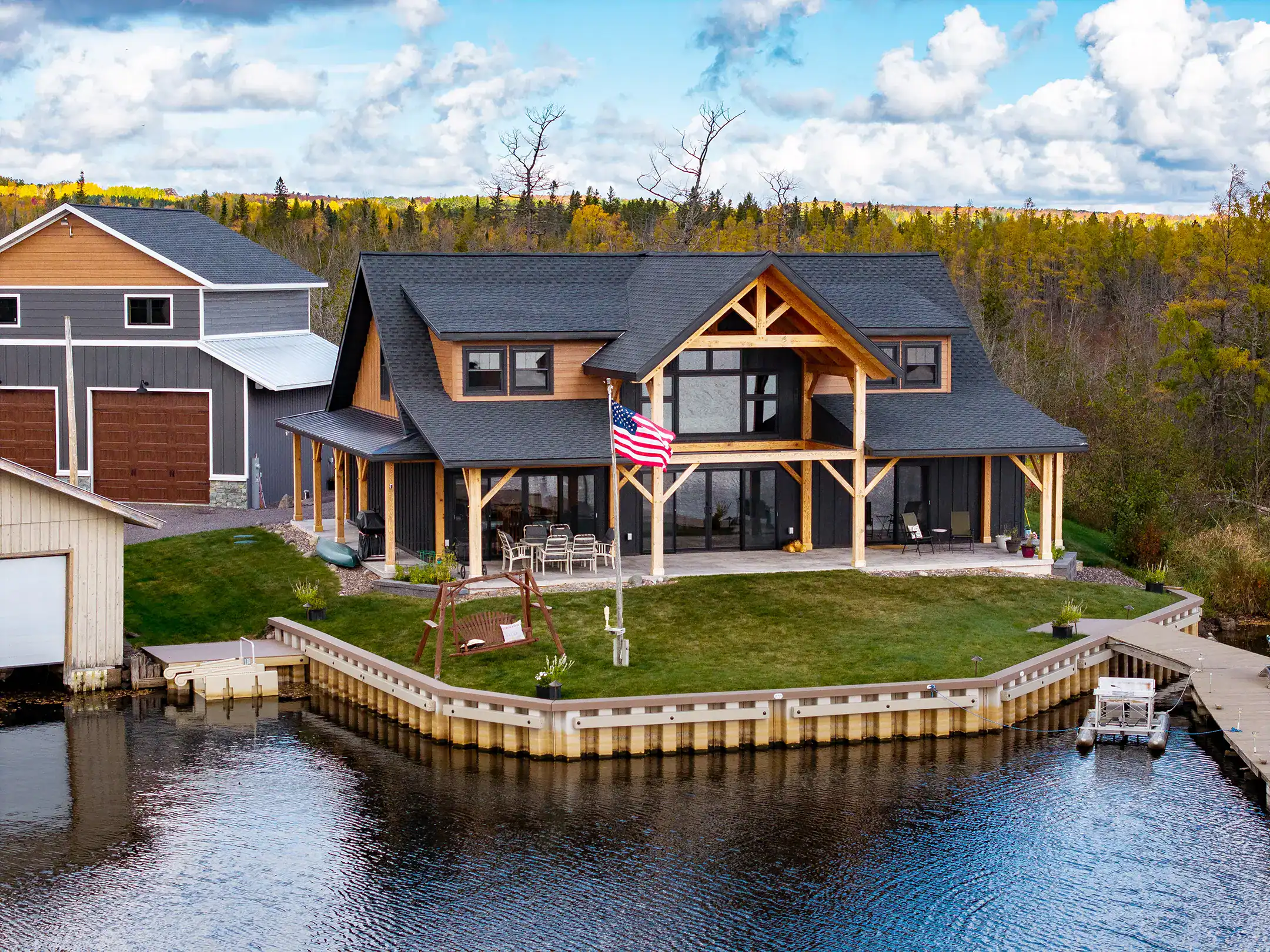 Upper Peninsula waterfront timber frame home photographed by Citadel Photography — view 1