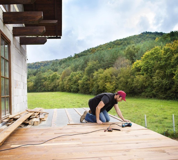 person sitting on chair using Surface