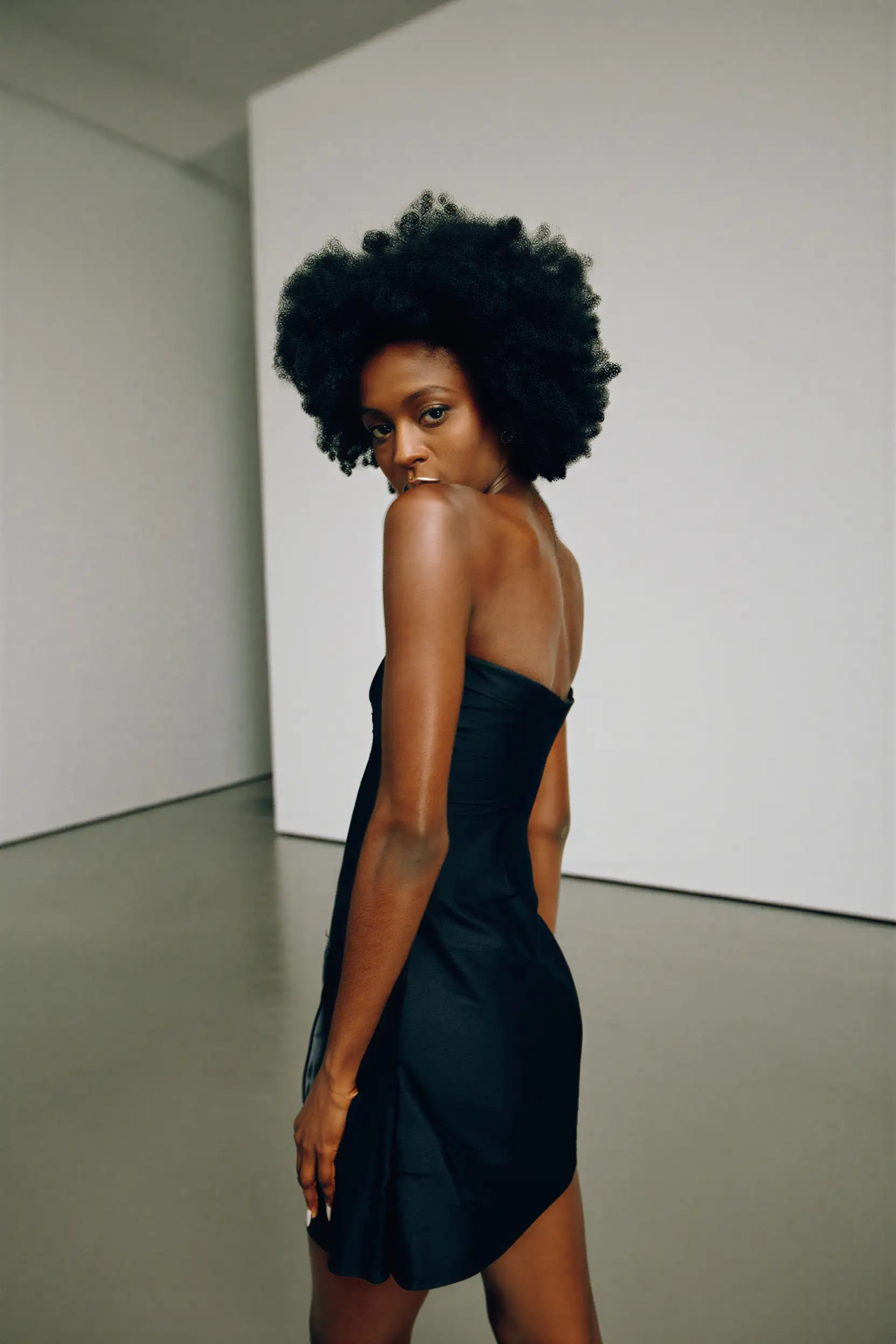 Two men talking, one wears a veteran hat.